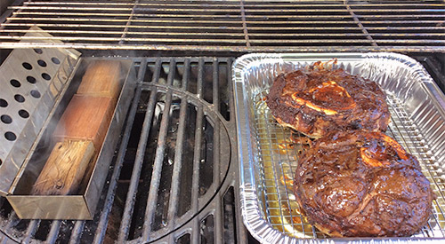 Grilling our Smoked Beef Shanks on the Gas grill with Double filet wood chunks in our smoker box!