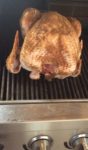 Placing the Turkey on the grill