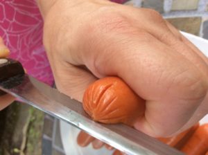 cutting the end of each hot dog with an X allows the juices for run out 